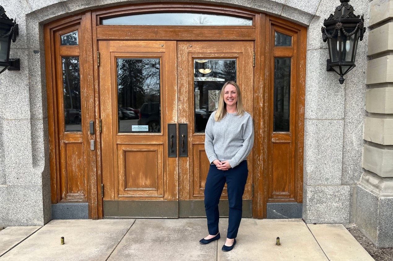 A photo shows Megan Zawacki standing outside for a photo.